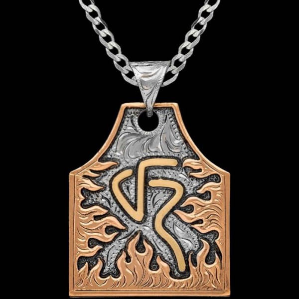 Meet the Cayenne Cow Tag Necklace boasting a hand engraved  German Silver base with an irresistible hand-engraved copper flames frame and your custom ranch brand. Pair it with a special discount sterling silver chain! 